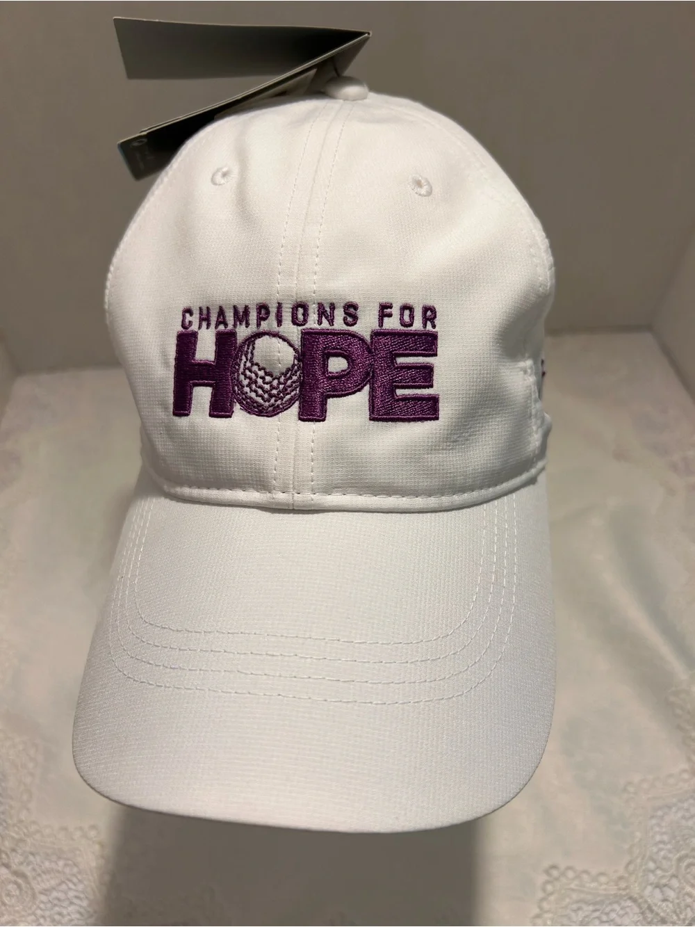 Nike Champions For Hope Dri-Fit Golf Cap with purple embroidery